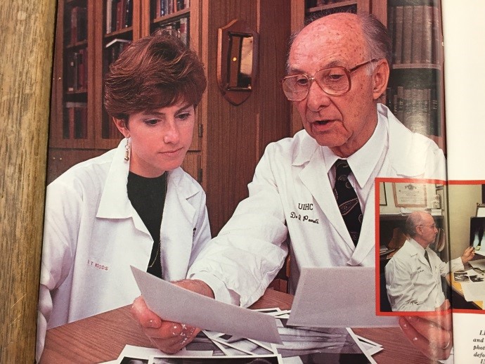 Theresa conferring with Dr. Ponsetti in 1994